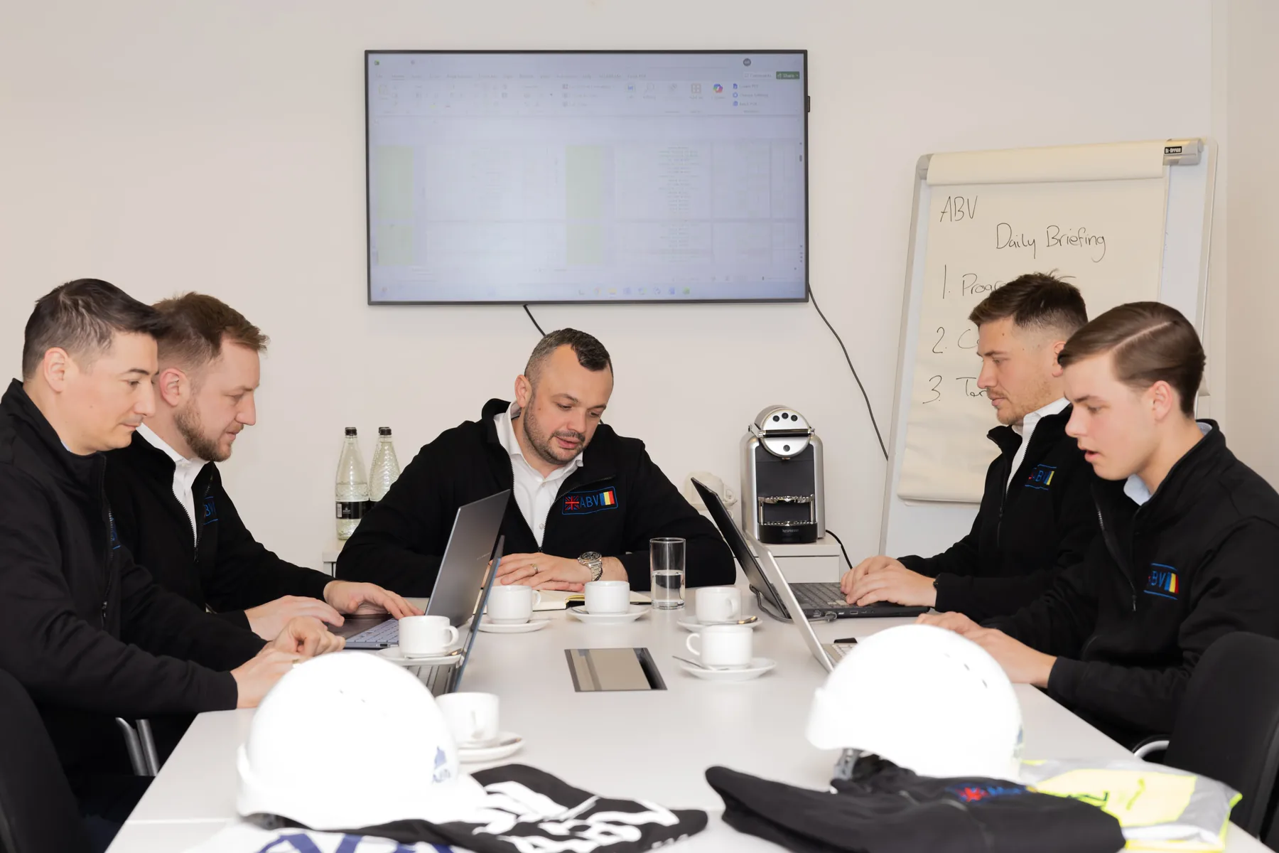 ABV Contractor team collaborating on project plans